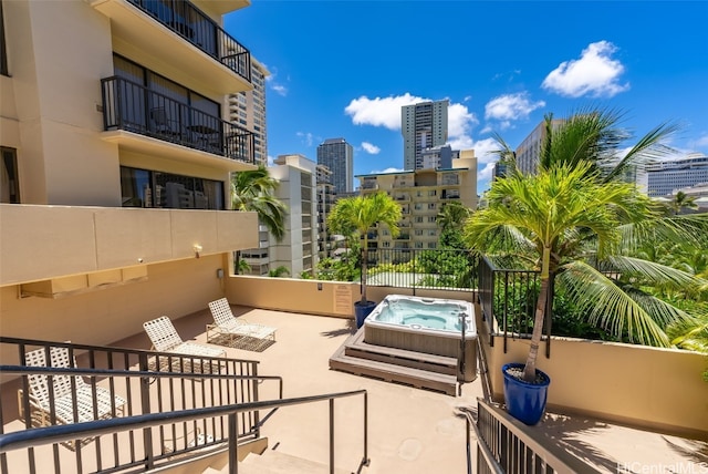 view of patio / terrace featuring a hot tub