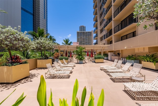 exterior space with a pergola and a patio area