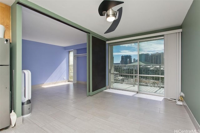 empty room featuring ceiling fan