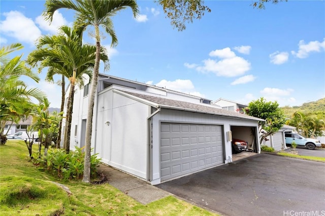 view of home's exterior with a garage