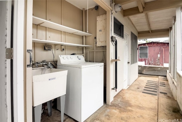 laundry room with washer / dryer