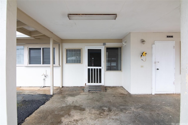 doorway to property with visible vents
