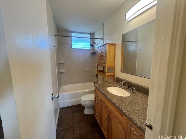 full bathroom with vanity, toilet, and tiled shower / bath