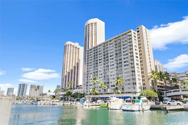 property view of water featuring a boat dock