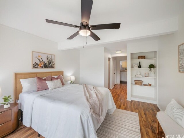 bedroom featuring wood-type flooring and ceiling fan