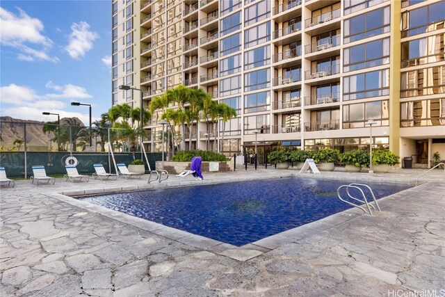 view of pool with a patio area