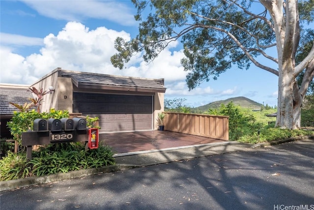 garage featuring a mountain view