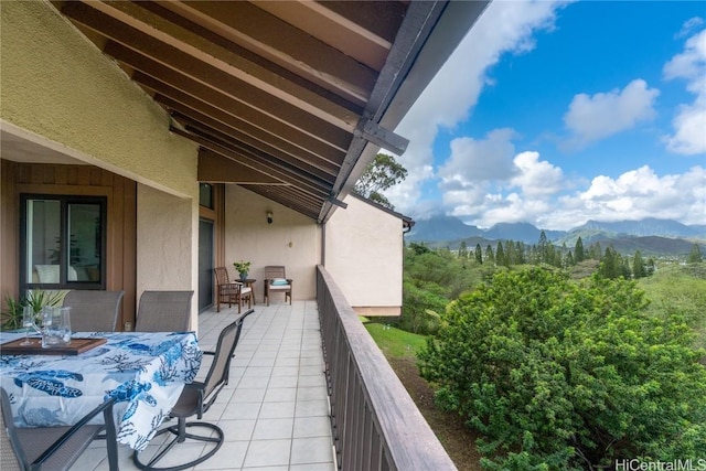 balcony featuring a mountain view