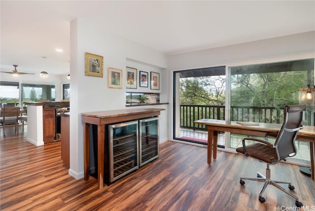 office with dark wood-type flooring and beverage cooler