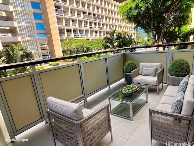 balcony with an outdoor hangout area