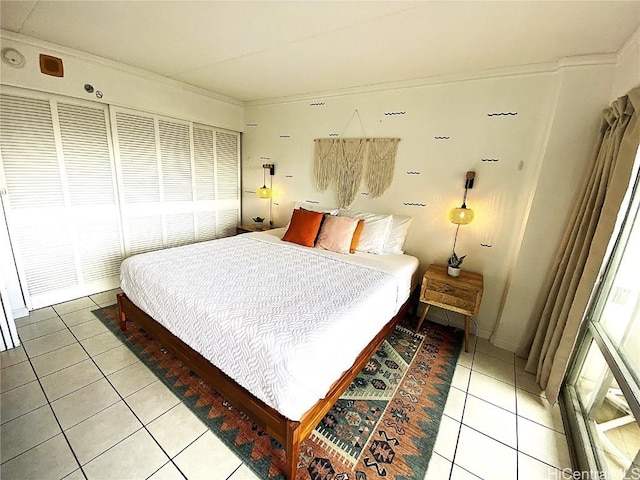 tiled bedroom with ornamental molding