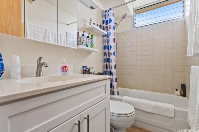 full bathroom featuring vanity, toilet, and shower / bath combo