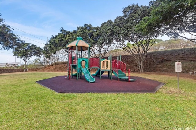 view of playground featuring a lawn