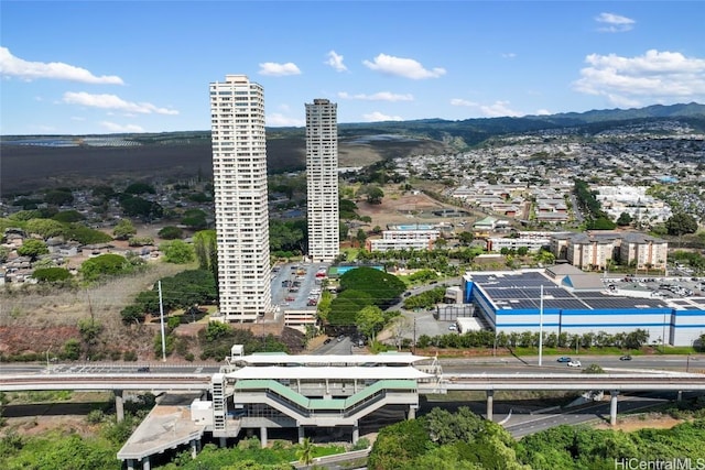 drone / aerial view featuring a mountain view