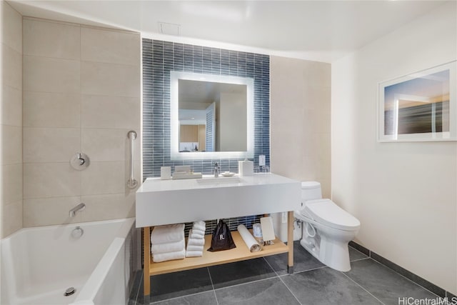 full bathroom with bathing tub / shower combination, tile patterned flooring, sink, tile walls, and toilet