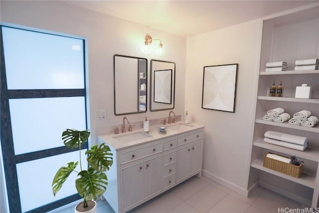 bathroom featuring tile patterned floors and vanity