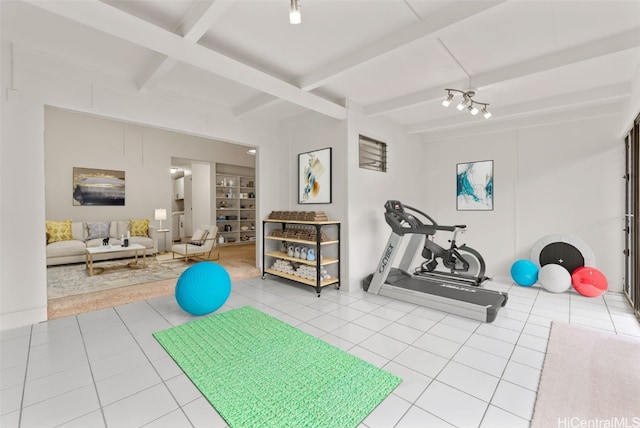 workout room with light tile patterned floors