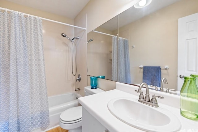 bathroom with vanity, toilet, and shower / tub combo with curtain