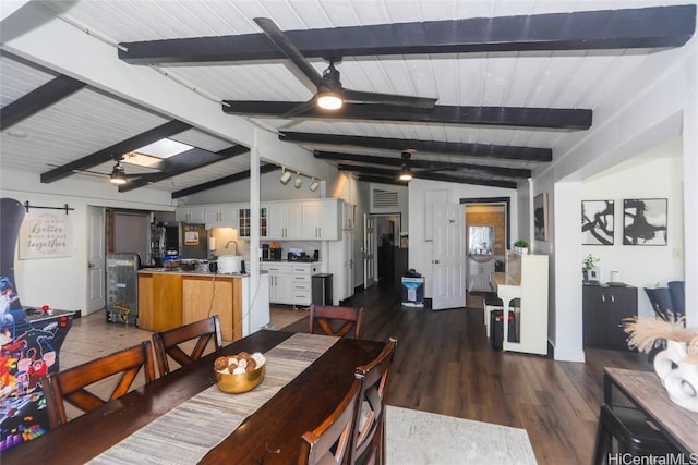 dining room featuring vaulted ceiling with beams, dark wood-type flooring, and ceiling fan