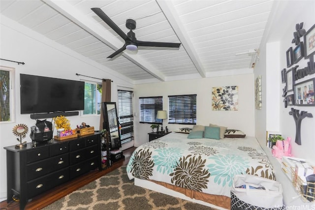 bedroom with ceiling fan, vaulted ceiling with beams, wooden ceiling, and dark hardwood / wood-style floors