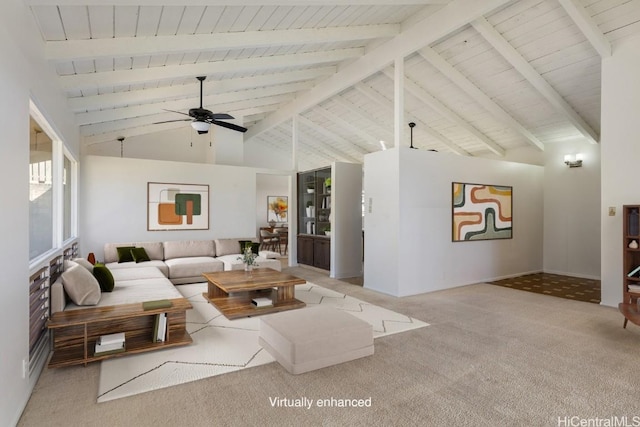 carpeted living room with beamed ceiling, high vaulted ceiling, and ceiling fan