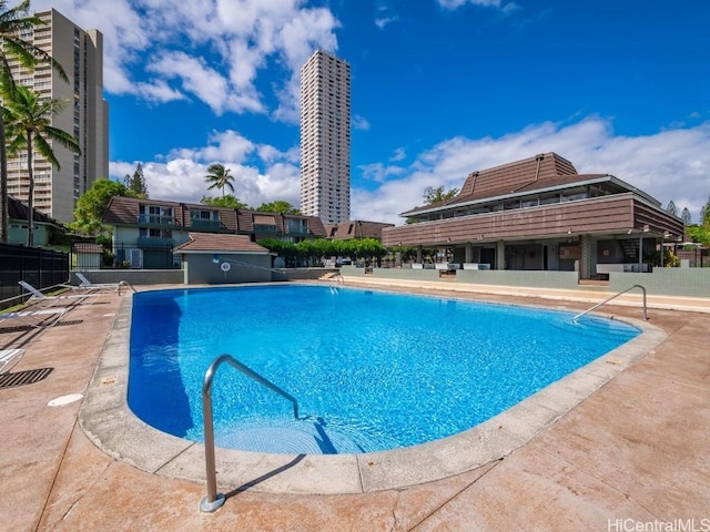 view of pool featuring a patio area