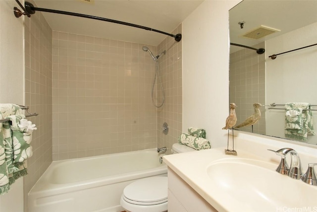 full bathroom with toilet, vanity, and bathing tub / shower combination