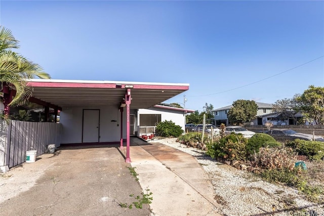 exterior space featuring a carport