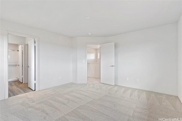 unfurnished bedroom featuring carpet floors