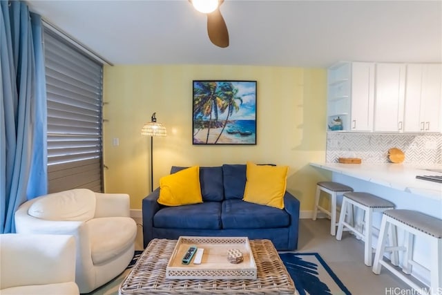 living room with ceiling fan