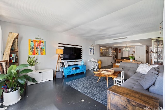 living room with concrete flooring