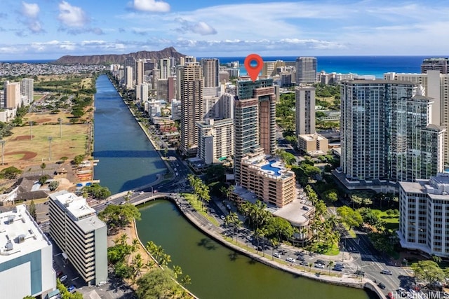 birds eye view of property featuring a water view