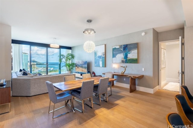 dining area with wood-type flooring