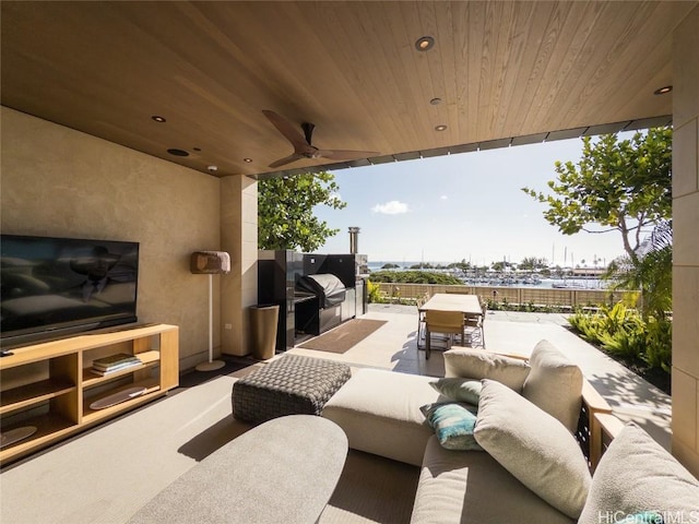 view of patio / terrace featuring ceiling fan and outdoor lounge area