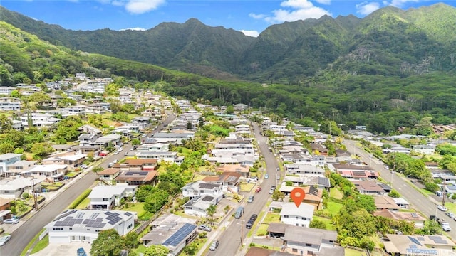 aerial view with a forest view, a residential view, and a mountain view