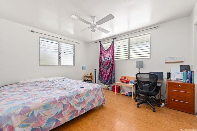 854 Hao St, Honolulu, HI 96821 - bedroom featuring light wood-type flooring and ceiling fan