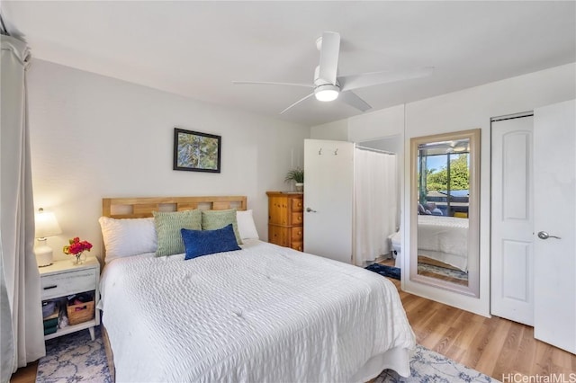 bedroom featuring ceiling fan and light wood-type flooring