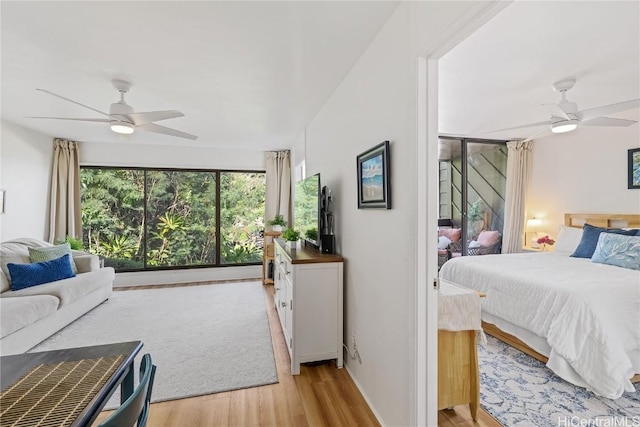 bedroom featuring ceiling fan and light wood-type flooring