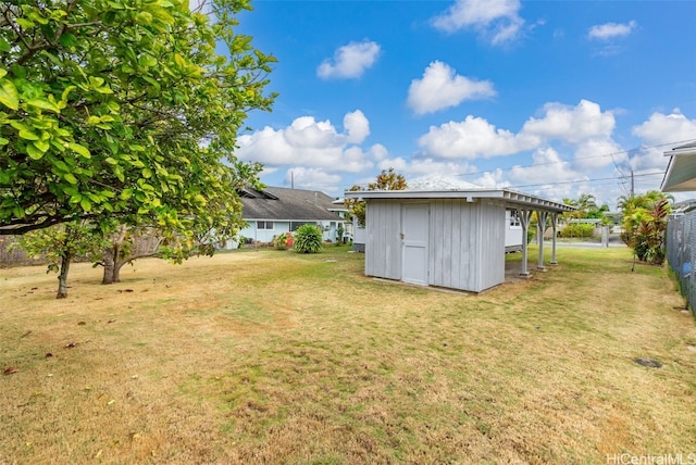 view of yard featuring a storage shed