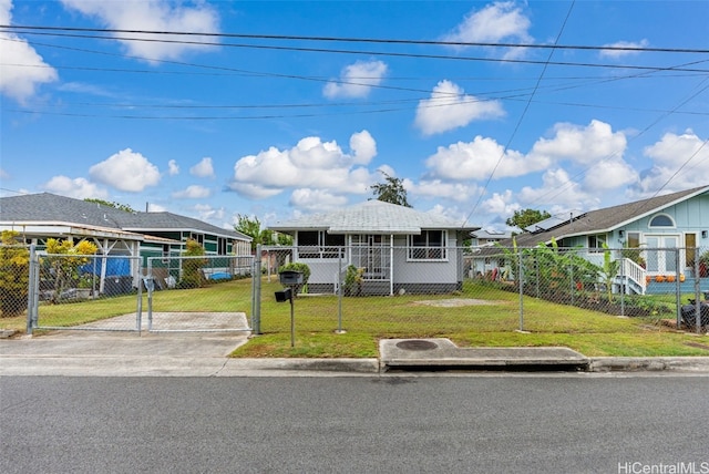 view of front of property with a front lawn