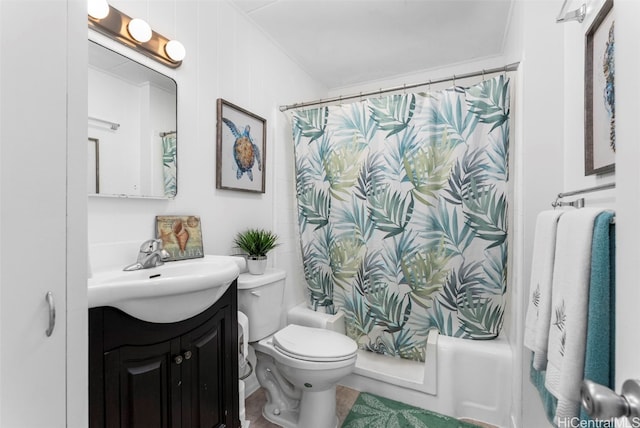 full bathroom with vanity, toilet, and shower / tub combo with curtain