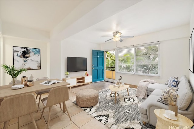 living room with light tile patterned floors and ceiling fan