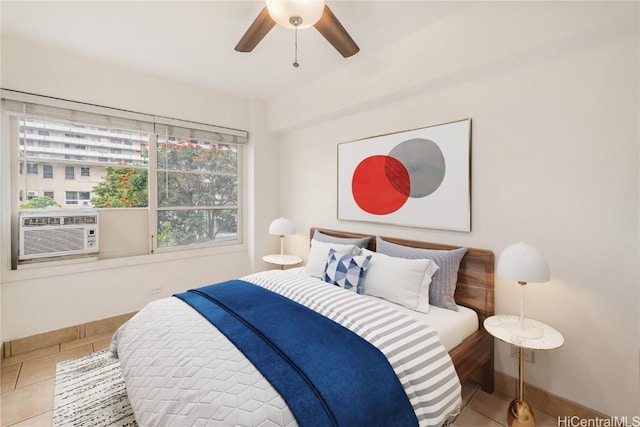 tiled bedroom with ceiling fan and cooling unit