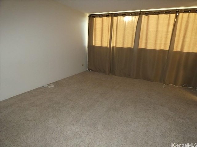 empty room with carpet flooring