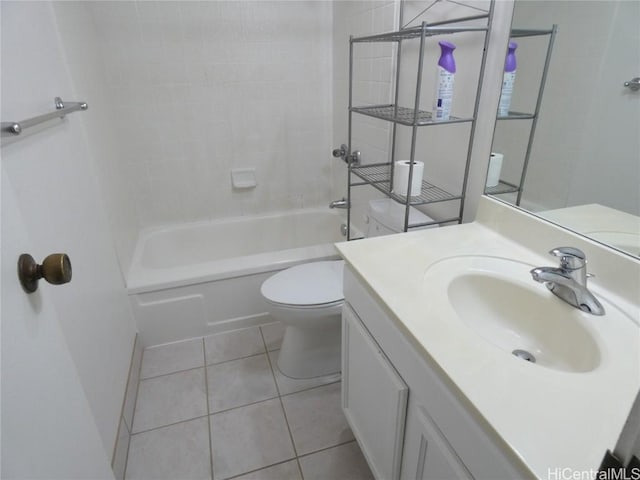 full bathroom featuring tiled shower / bath, toilet, tile patterned floors, and vanity