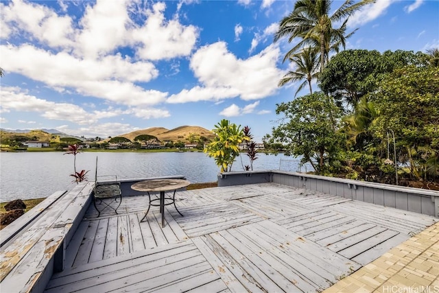 dock area with a water and mountain view