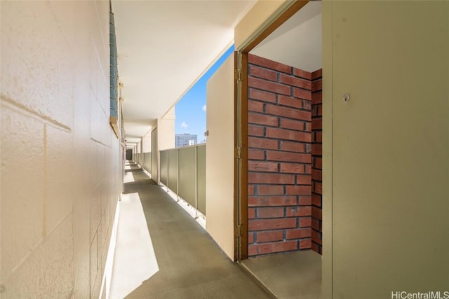 corridor with lofted ceiling