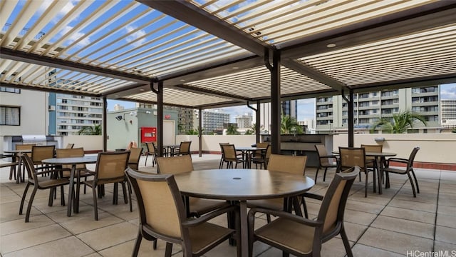 view of patio featuring a pergola