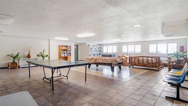 playroom featuring tile patterned floors