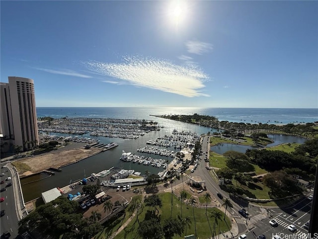 birds eye view of property featuring a water view